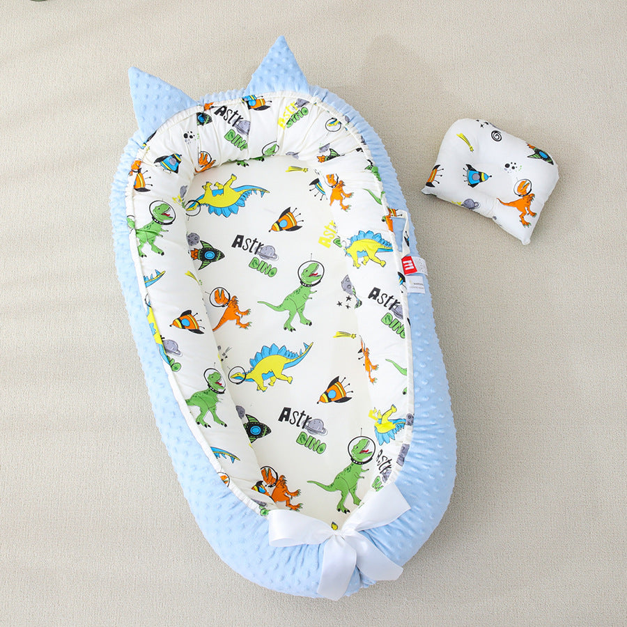 Bebe cocon Pour Nouveau-Né │ PetiteSouris™-_Dinosaure présenté avec son oreiller séparément