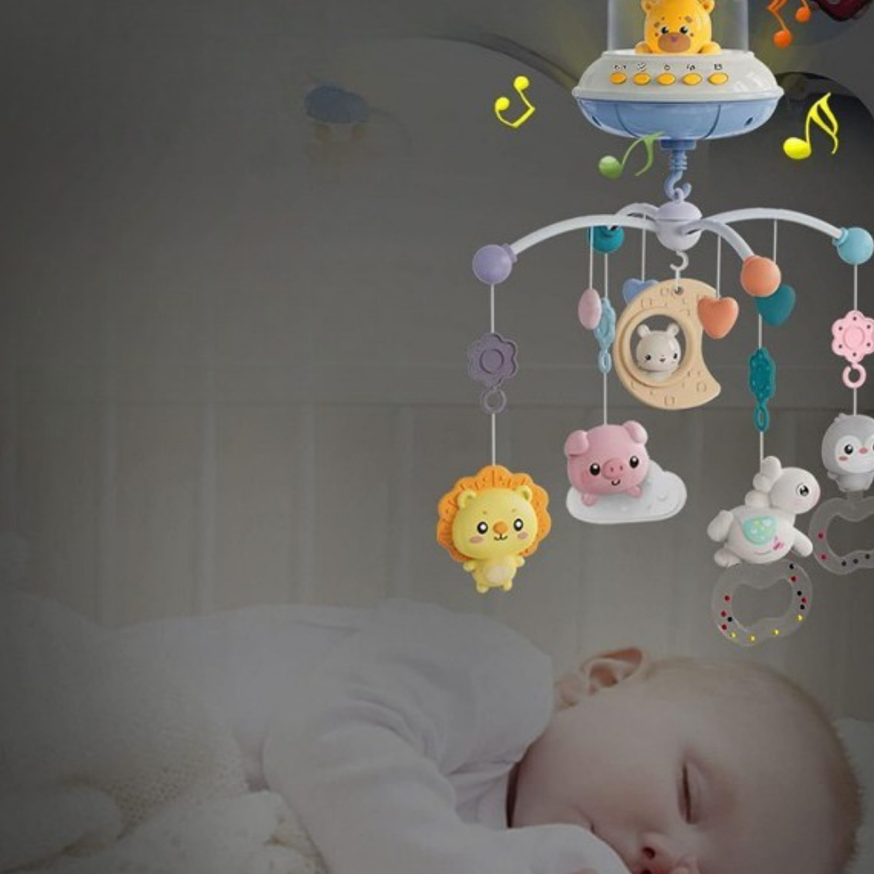 Bébé dormant en suçant son poussebercé par la musique du Mobile Musical Bébé Animaux-BabyLulla