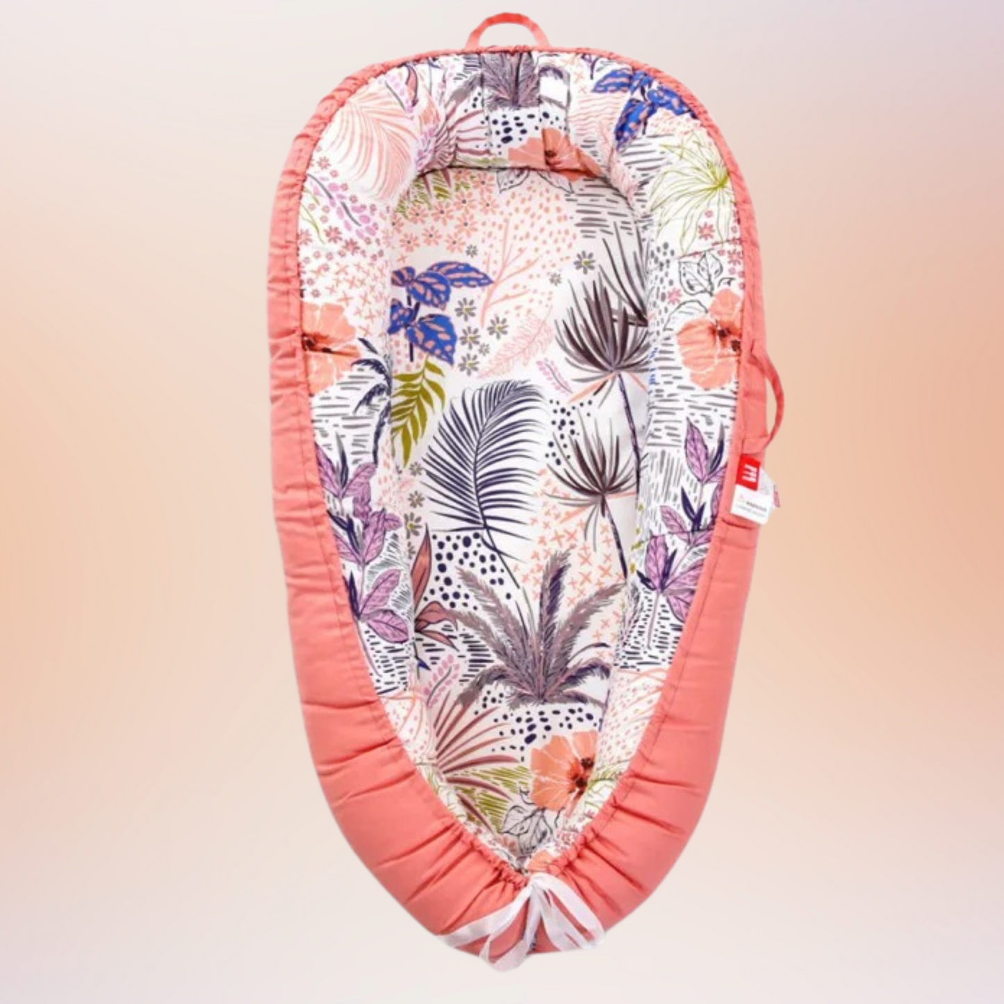 Gros plan sur le Réducteur de lit pour bébé motifs fleurs │ FlowersMulti™Feuilles roses