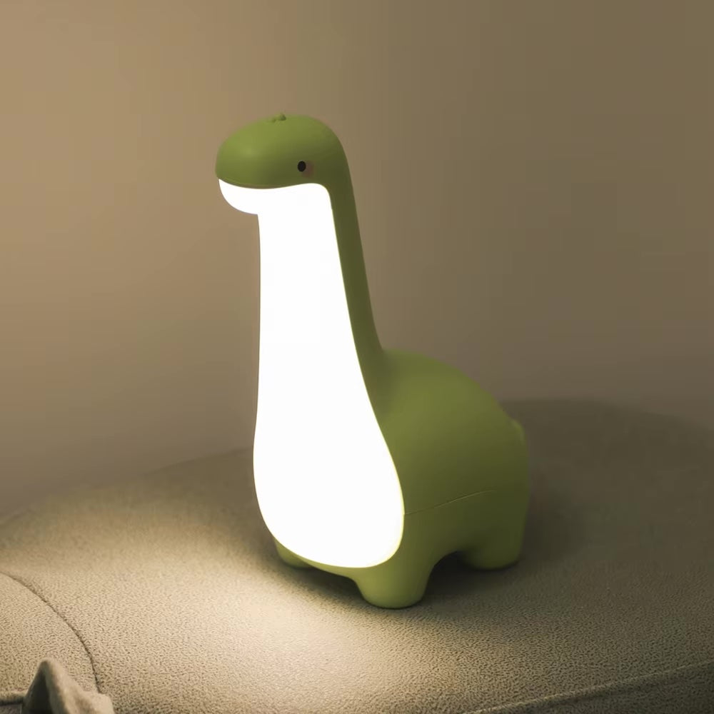 Gros plan sur la veilleuse bébé dinosaure_DinoNight_-Vert