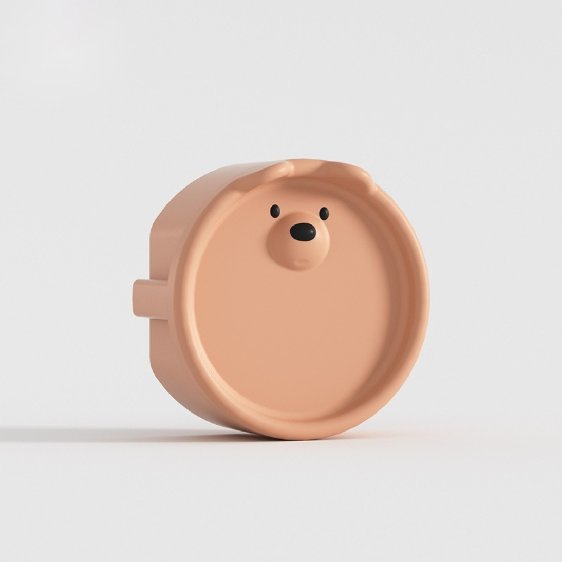 Cache prise bebe ours couleur poudre en silicone, nuance douce et apaisante pour la chambre de bébé.