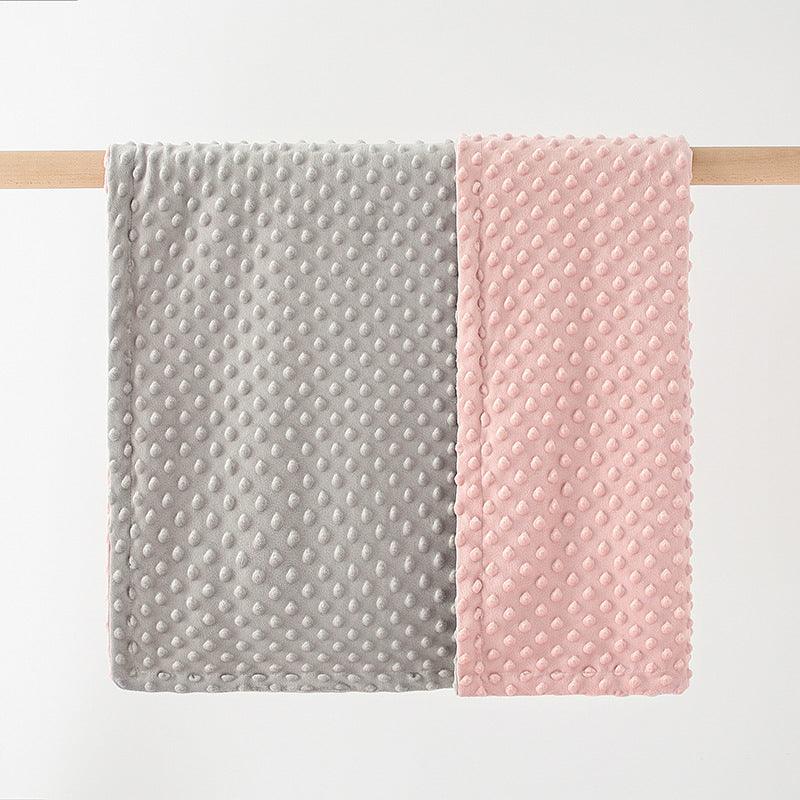 COUVERTURE BEBE REVERSIBLE -  DouceBulle™- rose et gris suspendue à une barre