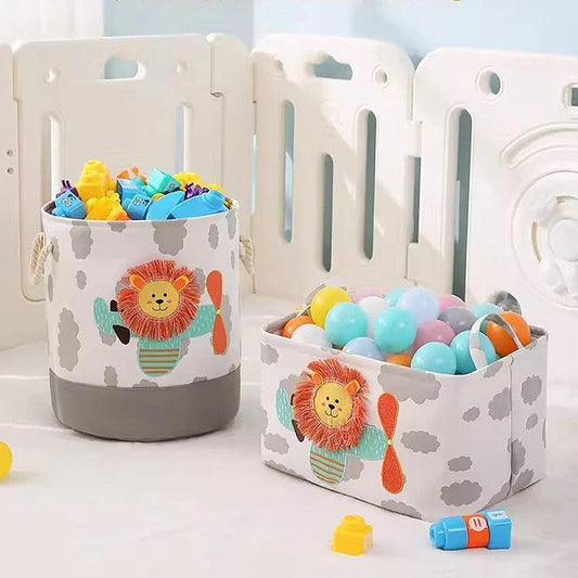 Panier de rangement bébé motif lion, pratique pour jouets, peluches et accessoires, idéal pour organiser la chambre de bébé avec une touche ludique.
