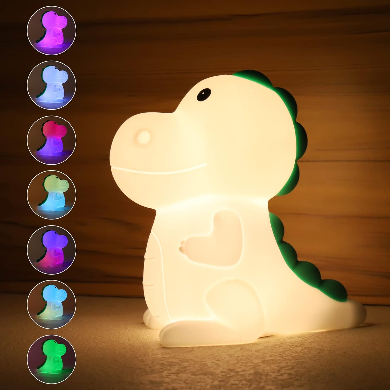Veilleuse Bébé LED Dinosaure Rechargeable Tactile | DreamLight™ affichant différents modes lumineux multicolores apaisants pour chambre d’enfant.
