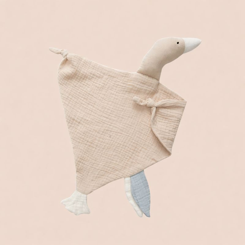 Doudou bébé canard DuckyDoux en tissu doux, idéal pour rassurer bébé dès la naissance