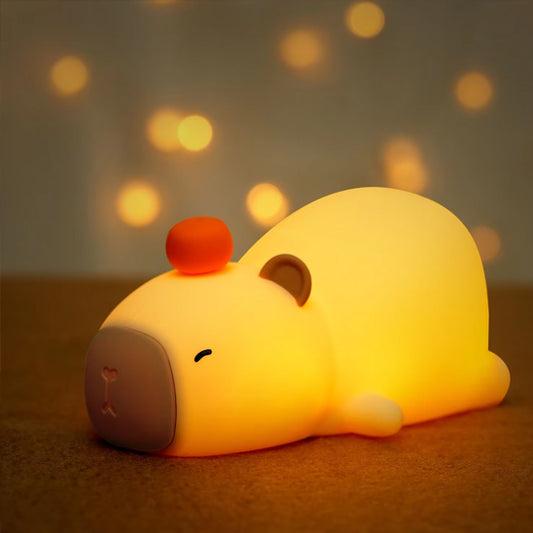 veilleuse bébé capybara lumineuse, en forme d'animal couché, ambiance douce et tamisée pour chambre de bébé