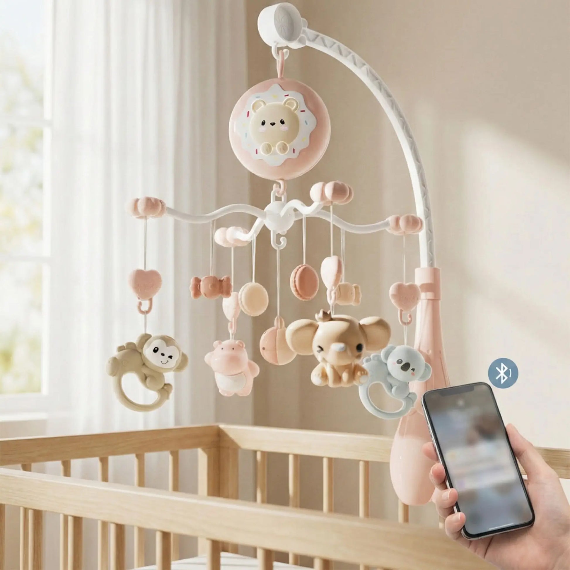 Mobile musique bebe ChatonNuit™ rose poudré bluetooth au-dessus du berceau