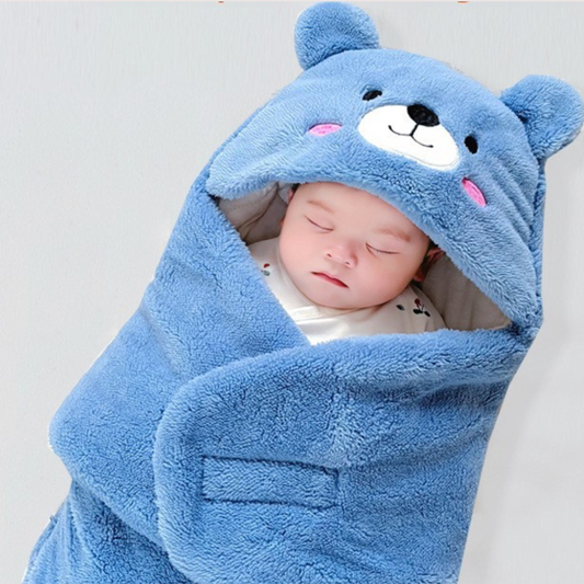 nid d’ange bébé ultra doux bleu enveloppant bébé endormi