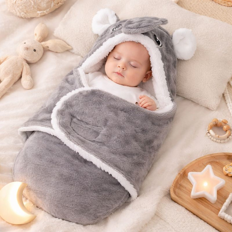 nid d’ange CozyAngel gris dans une chambre apaisante avec bébé endormi en sécurité