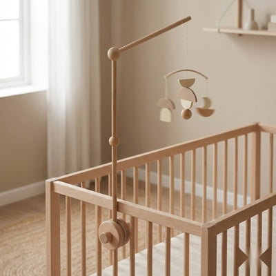 support mobile bebe PtiFix installé au-dessus du berceau de votre bébé