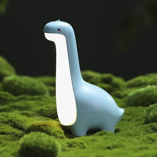 Gros plan sur la veilleuse bébé dinosaure_DinoNight_-Bleu